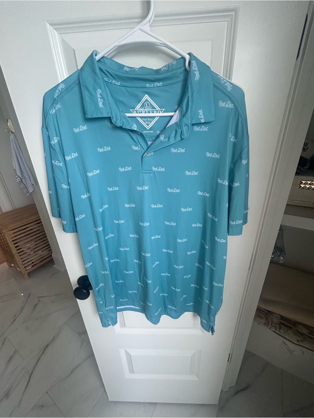 BURLEBO men’s polo in teal “rad dad” print- size Large